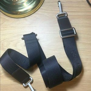 Louis Vuitton shoulder strap.